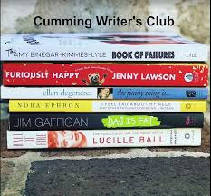 Cumming Writer’s Club Facebook group image featuring a stack of books.